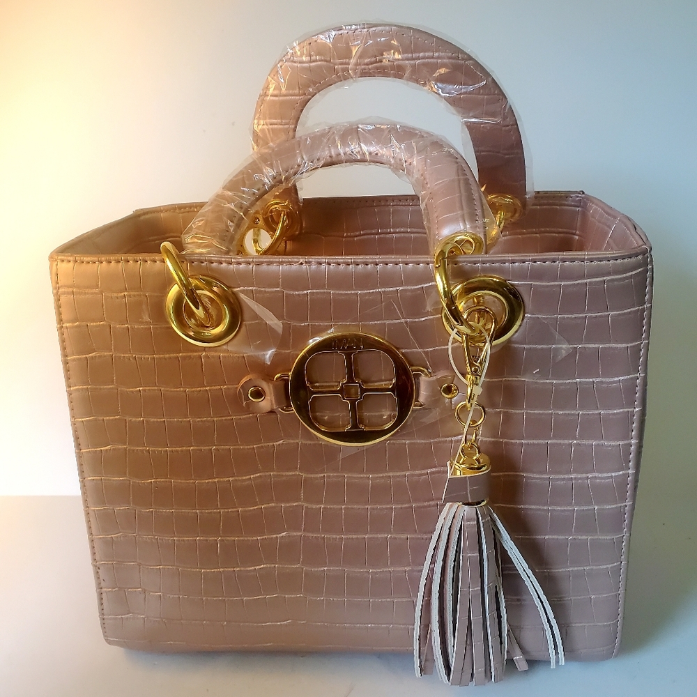 Iman rose gold, hand purse